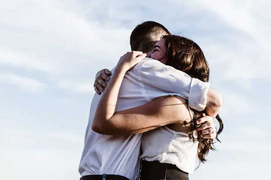 No, A Hug Isn't COVID-Safe. But If You Have To Do It, Here's What To Keep In Mind